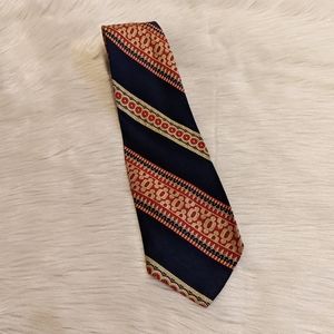 Vintage Beau Brummell Mr. Wonderful navy blue, gold and red print tie